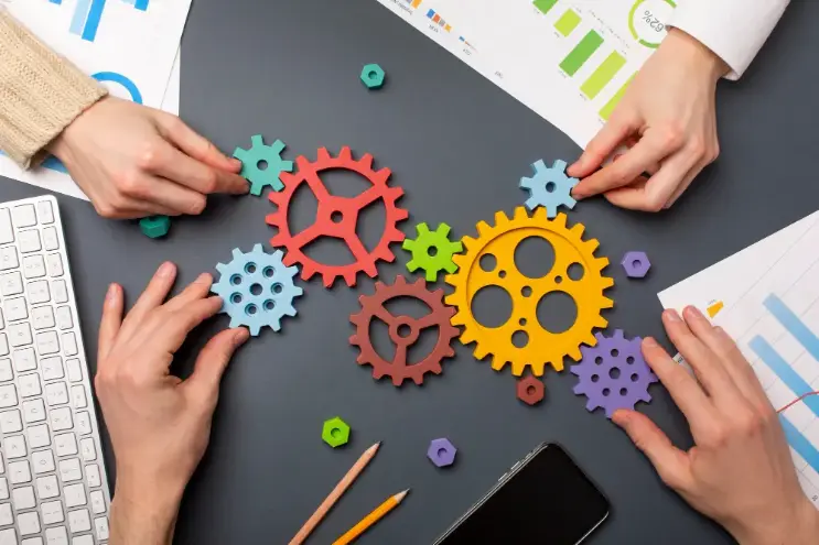 hands with gears representing business automation